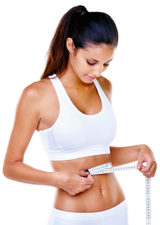 A woman in a white sports outfit measures her waist with a tape measure, looking down at the measurement.
